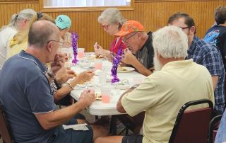 People enjoying the Three Rivers Promise Fish Fry