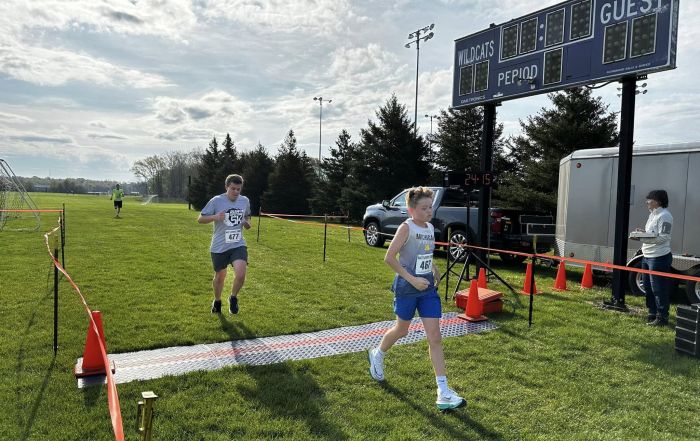 Runners crossing the finish line at the 2024 Three Rivers Promise Run For The Future 5K