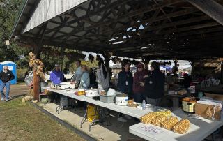 Volunteers working the 2024 Three Rivers Promise potato bar during the Three Rivers Area Color Tour