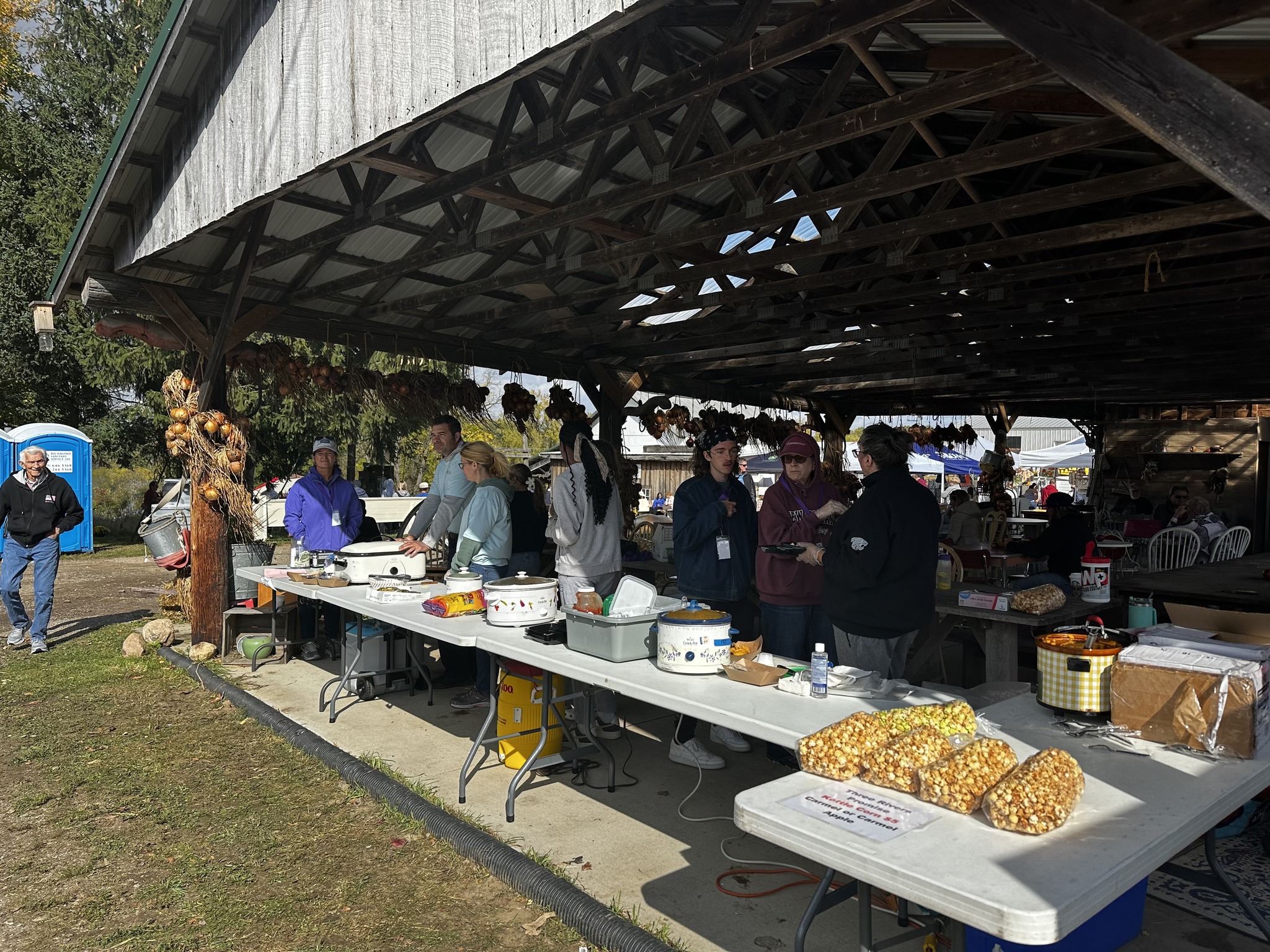 Volunteers working the 2024 Three Rivers Promise potato bar during the Three Rivers Area Color Tour